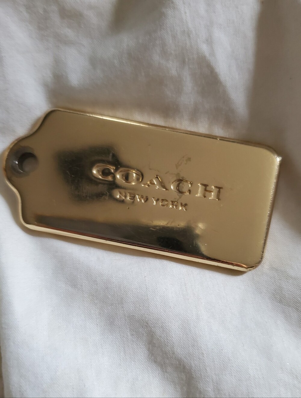 Coach Gold Metallic Phone Charm Tag